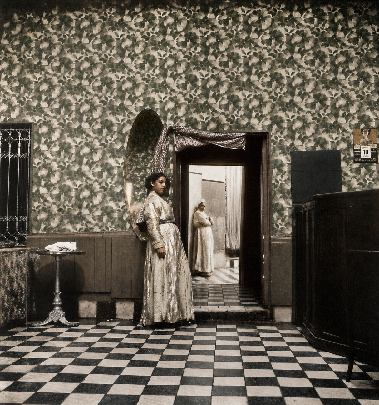 A mysterious interior in the Middle East. Beckoning women, the light falling in the room beyond, patterns on the floor and walls -- these are the centers which create this atmosphere.
