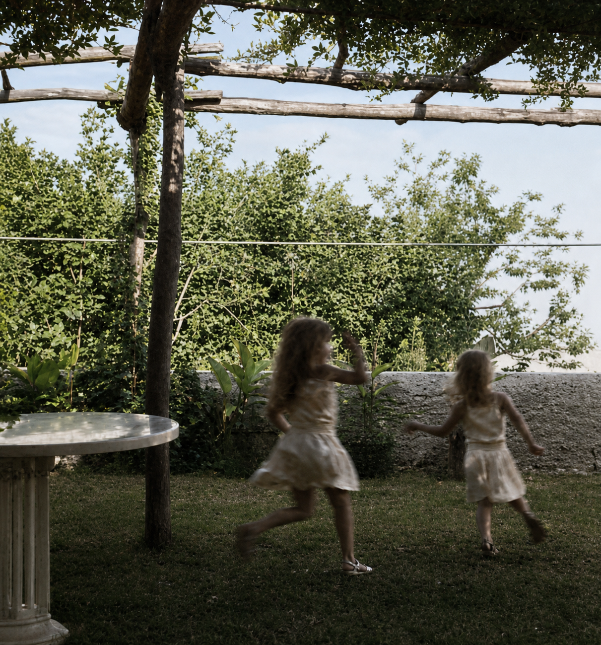The small garden at the end of the terrace which helps bring life by encouraging and supporting the children running to and fro.