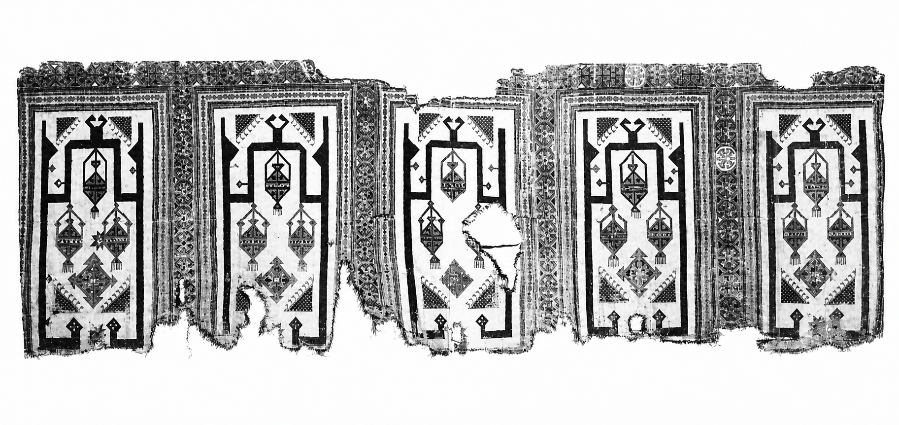 15th century Turkish carpet with multiple niches