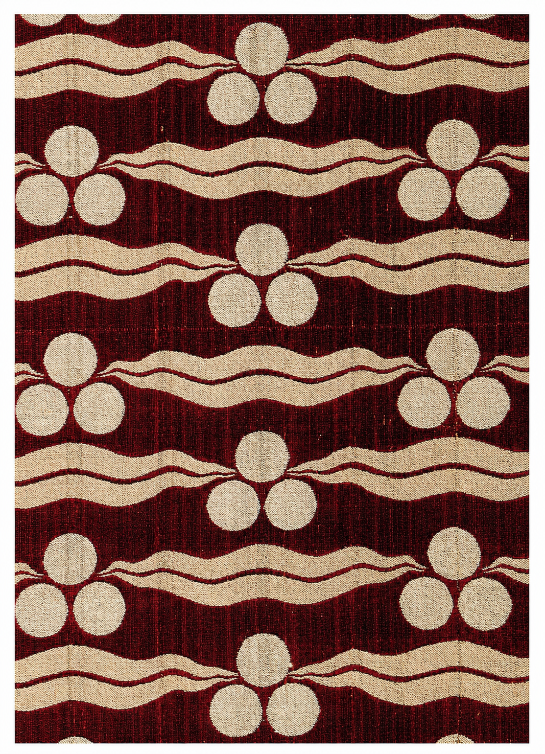 The ''chintamani"' design in a 1Sth-century Turkish velvet: a waving alternation of color creates a passion ate life in the space.