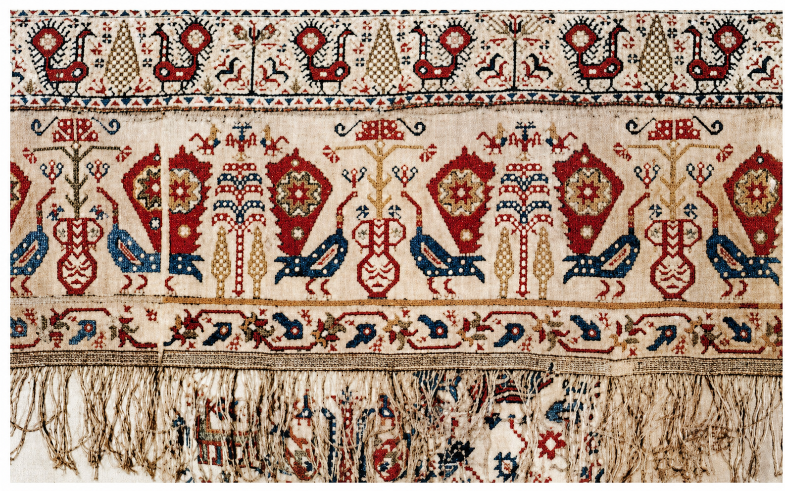 Beautiful alternating repetition in a Greek embroidery, Centers are formed everywhere, in the repetition of the embroidered forms and in the spaces between the repetitions.