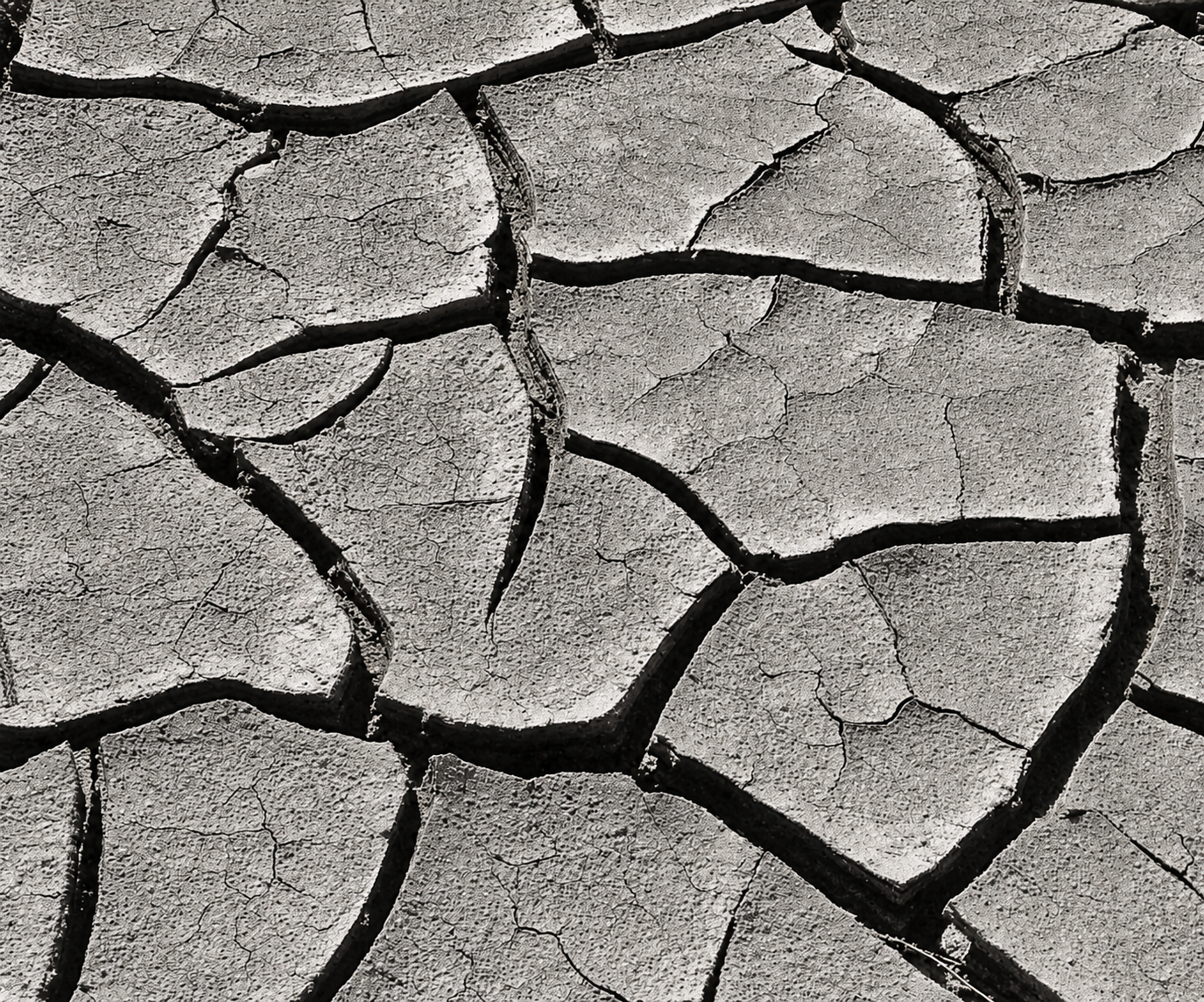 Mud cracks in the surface of the Borro desert show how large coherent pieces, have, within them, less well-defined smaller pieces, which in turn have cracks next to them as a next level down.