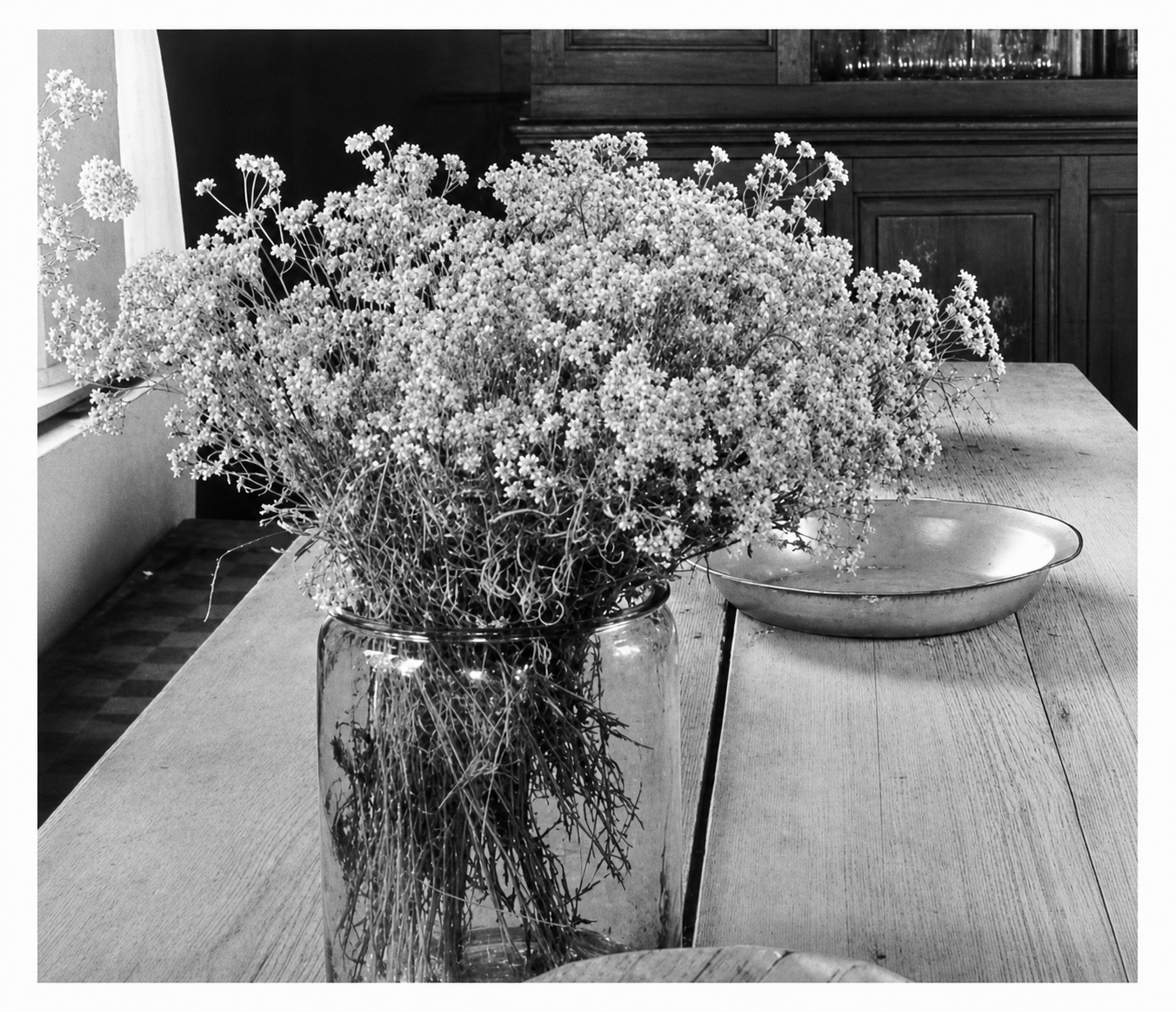 A handful of flowers put in a jar