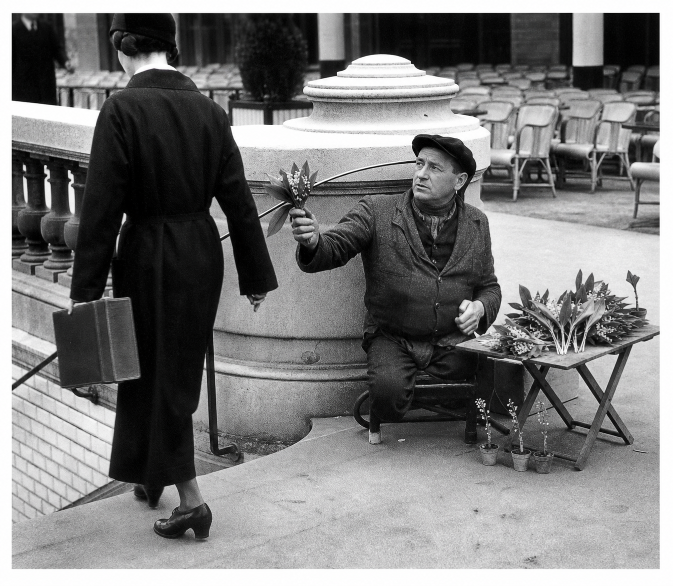 The girl ignores the flower seller without legs